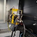 新到一套为公255四，配发那科系统，带圆盘尾座，带L块.