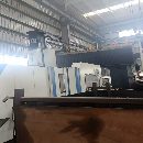 湖南工厂刚刚买下国盛4027龙门一台，工作台2米4米，门.